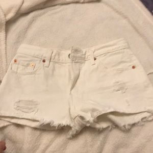Levi’s 501 shorts. White